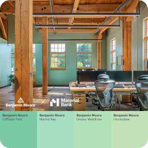 A workspace with exposed wood beams and green painted walls. At the bottom of the image are 4 swatches of various shades of green Benjamin Moore paint. 