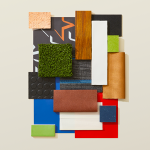 A game day design inspired collection of materials including bold colors of red and blue, green grass, rich woods and supple leathers.