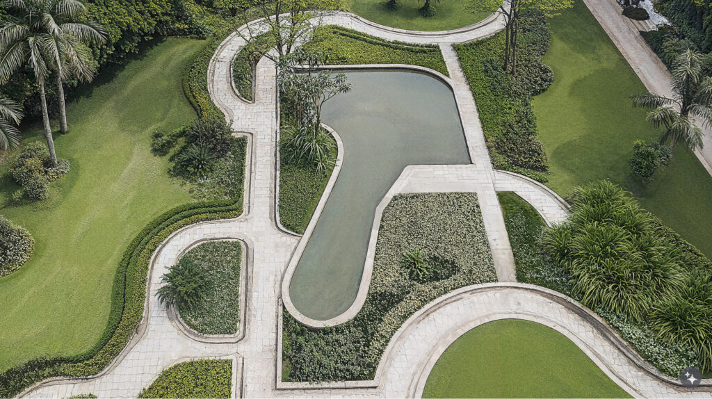 A Brazilian Modernist Designed gardens with curved stone pathways, water features and gardens.