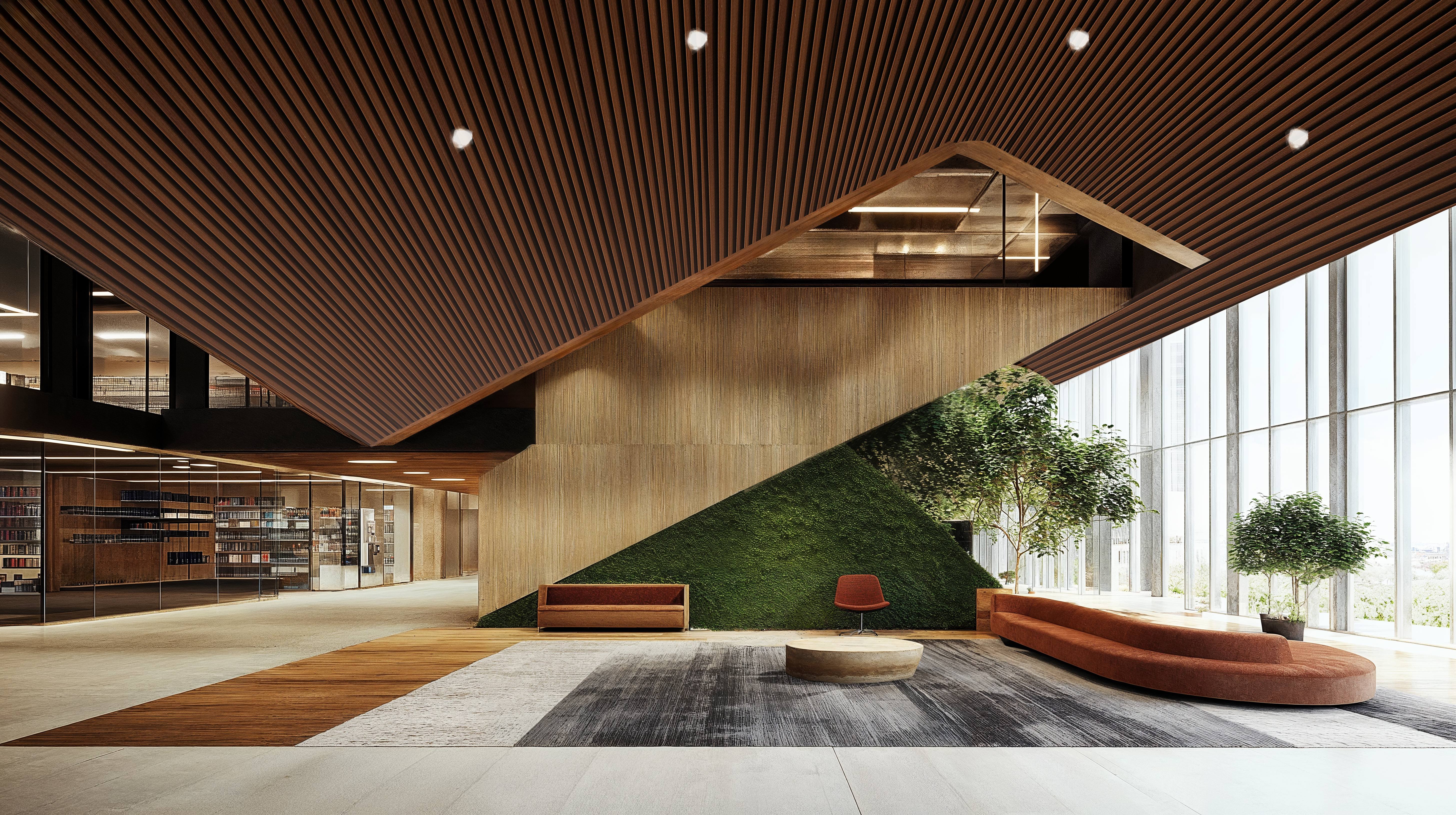 An office lobby with luscious greenery, wooden acoustical paneled ceilings, and laminate flooring.