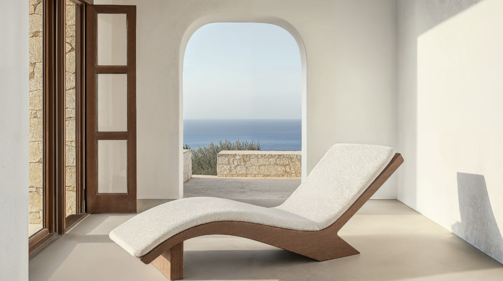 Greek Island design in a healthcare space with whitewashed walls, wood accents, and scenic views of the water.