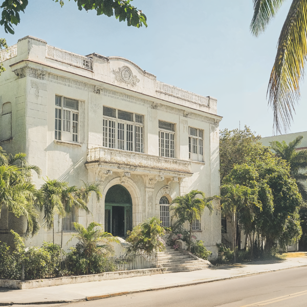 Cuban design embassy building exterior with neoclassical facades, grand plazas, and intricate balconies.