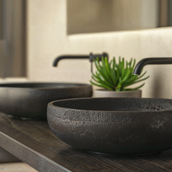 A close up shot of a minimalist bathroom with elevated bathroom fixtures.