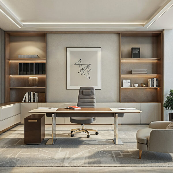 Modern office design in beige and gray color way. Gray area rug over light wood floors. Built in cabinets and shelves wrapped around the walls behind a desk and chair.