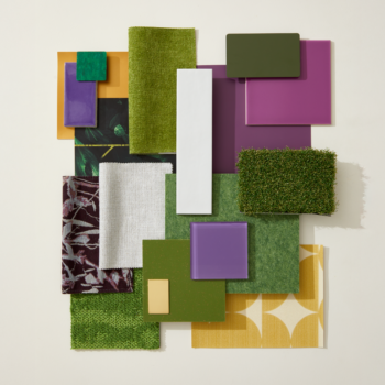 A flatlay photograph with green turf, purple tiles, and gold wallcoverings.