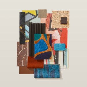 A flatlay photograph with red textiles, blue tiles, and colorful wallcoverings.