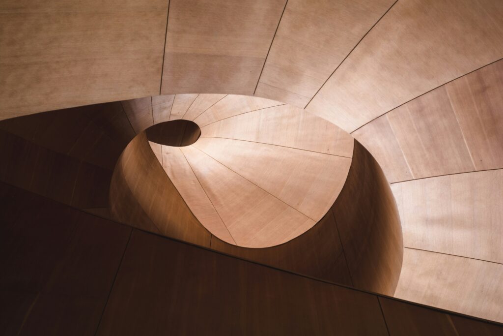 A close up photograph of a conceptual ceiling with a swirling geometric pattern.  