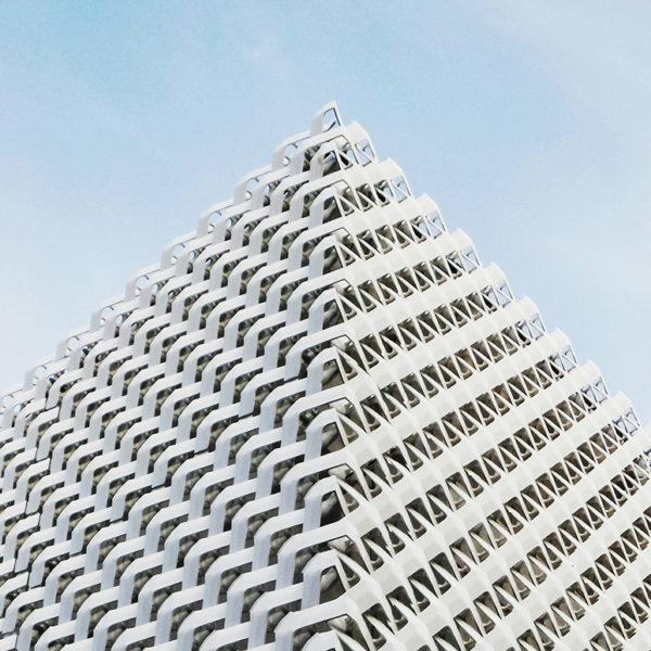 A tall building with a textured building skin made of white metal, with a triangular pattern and a perspective angle showing the right side in a closeup shot, against a light blue sky.