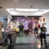 People walking through a hallway at High Point Market, the largest furniture and decorative accessories trade show in the world.