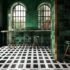 Restaurant with emerald green tiled walls and black and white floors.